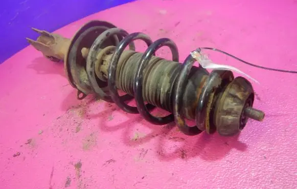 Volkswagen Lupo Front shock absorber with coil spring 