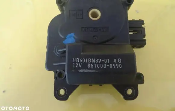 Mazda 3 I Air flap motor/actuator 861000-0990 8610000990 HB601BN8V-01
