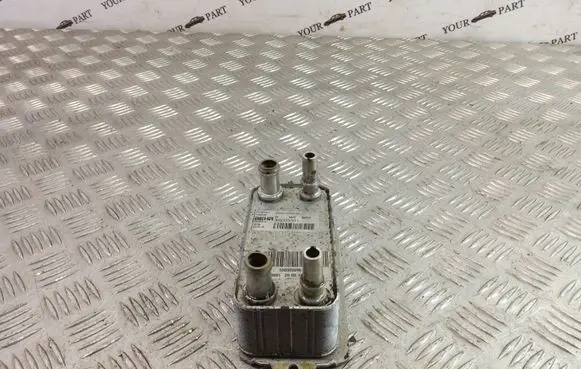 Jaguar XF Oil filter mounting bracket X6003001