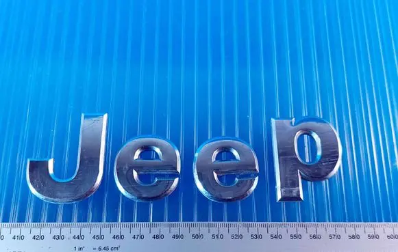Jeep Grand Cherokee Rear door emblem/model letters 