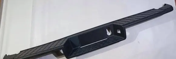 Rear bumper trim bar molding