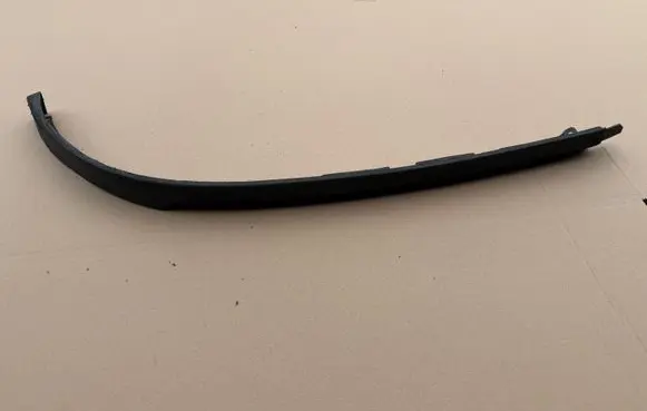 Opel Zafira B Front bumper lip 13247302