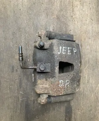 Jeep Grand Cherokee (WK) Front brake caliper