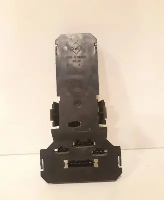 Tail light bulb cover holder