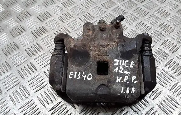 Nissan Juke I F15 Front brake caliper