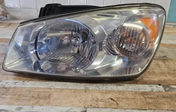 KIA Cerato Headlight/headlamp 921012E0