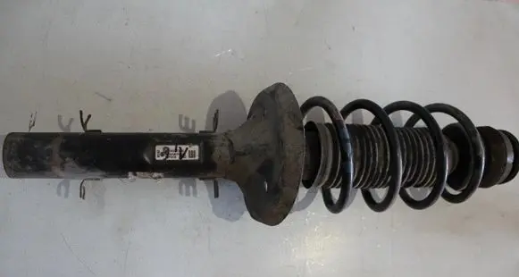 Volkswagen Golf IV Front shock absorber with coil spring 1J0413031S
