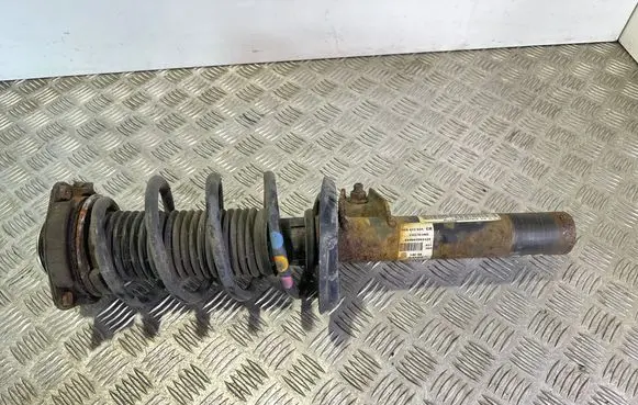 Front shock absorber with coil spring