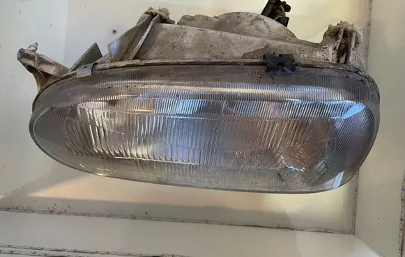 Volkswagen Golf III Headlight/headlamp 13886100L