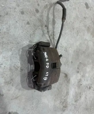 Volkswagen Golf VI Front brake caliper