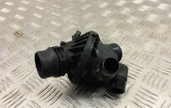 Thermostat/thermostat housing