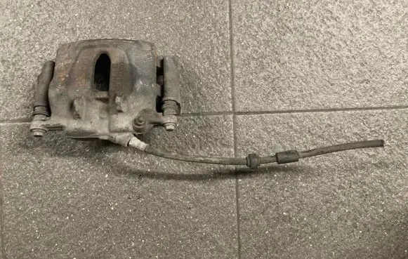 Renault Trafic II (X83) Front brake caliper 7711135702