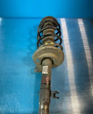 Peugeot 208 Front shock absorber with coil spring