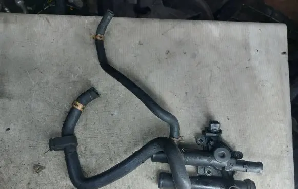 Thermostat/thermostat housing