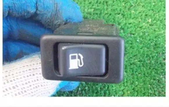 Nissan Maxima Fuel tank opening switch 