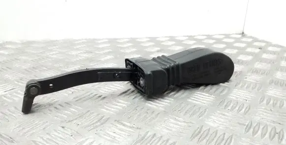 Front door check strap stopper
