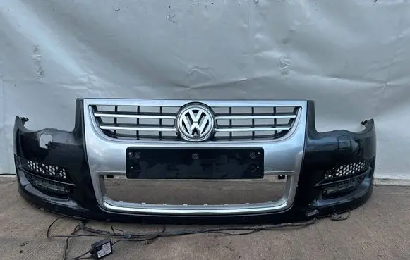 Volkswagen Touareg I Front bumper 7L9807061D 7L6853651H 7L6853651J