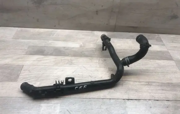 Volkswagen PASSAT B6 Engine coolant pipe/hose 03L121065AJ