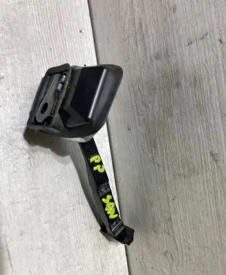 Front door check strap stopper