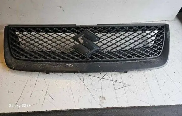 Suzuki Grand Vitara II Front bumper upper radiator grill 7174265J0