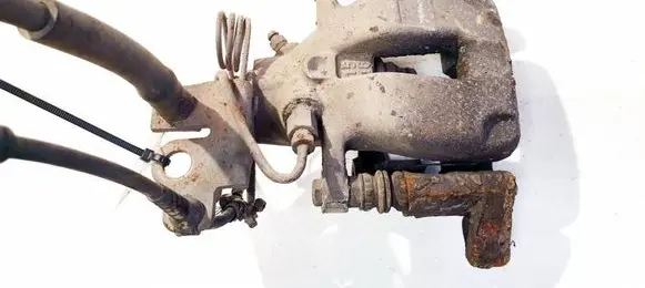 Volkswagen Caddy Rear brake caliper 