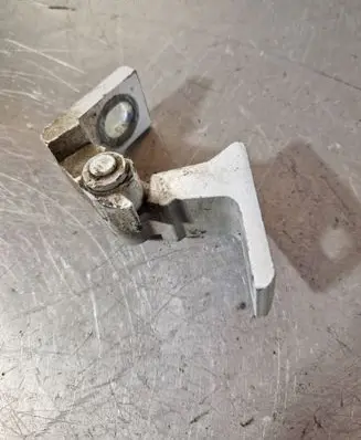 Front door lower hinge