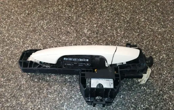 Rear door exterior handle/bracket