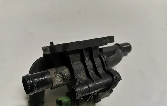 Thermostat/thermostat housing