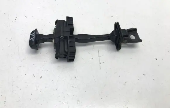 Front door check strap stopper