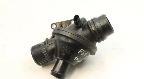 Thermostat/thermostat housing