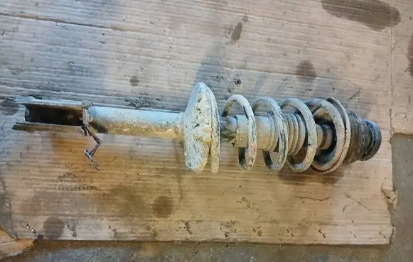 Front shock absorber with coil spring