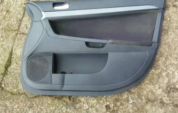 Mitsubishi Lancer X Front door card panel trim