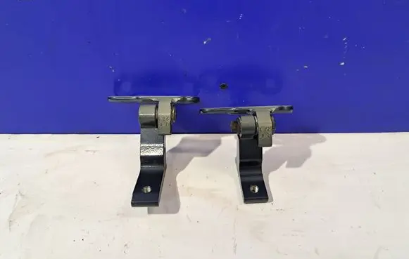 Rear door upper hinge