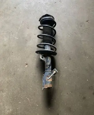 Nissan X-Trail T31 Front shock absorber with coil spring 54303JG72A