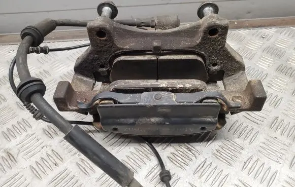 Mercedes-Benz GL X166 Front brake caliper A1665400105