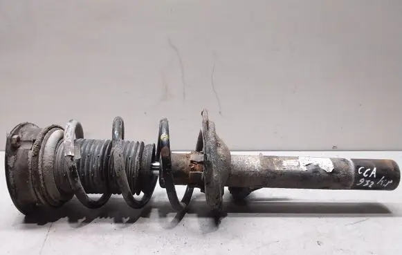 Volkswagen Golf VII Front shock absorber with coil spring 5Q0413023FL