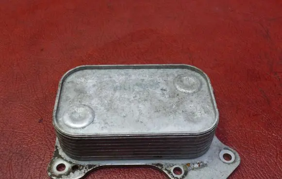 Opel Corsa D Engine oil radiator 