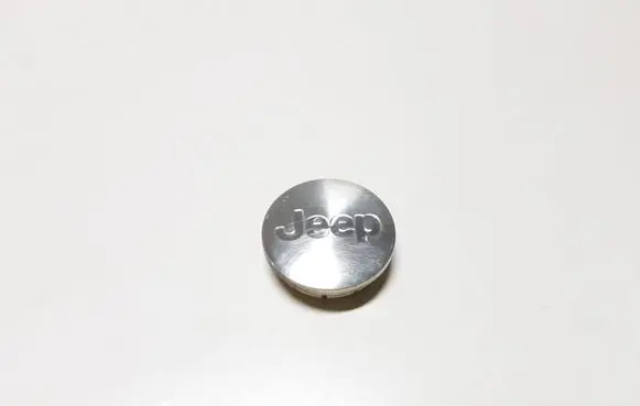 Jeep Grand Cherokee (WK) Original wheel cap 39699C 52090402AA