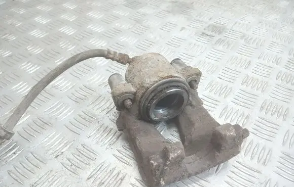 Volkswagen Golf IV Front brake caliper