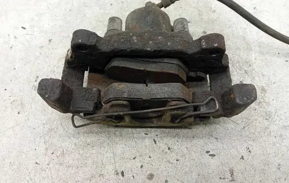 Volkswagen Touran I Front brake caliper