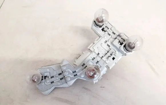 Volvo V50 Tail light bulb cover holder 28129007