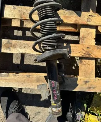 Volvo V50 Front shock absorber with coil spring 12441212