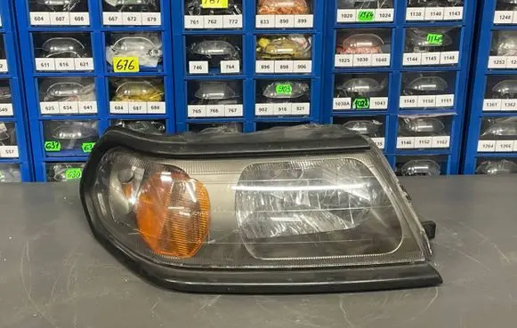 Mitsubishi Pajero Sport I Headlight/headlamp 10087415