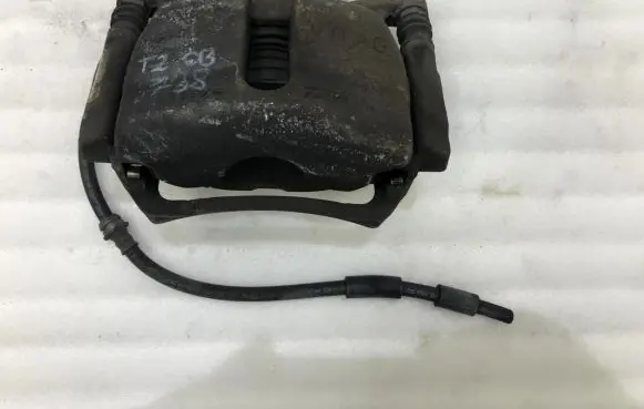 Volkswagen Touran III Front brake caliper
