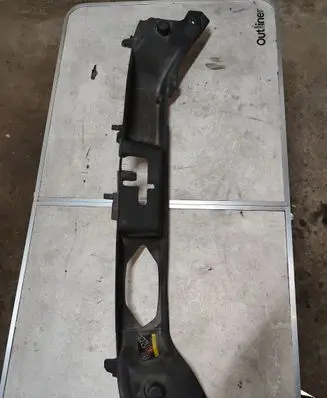 Top upper radiator support slam panel