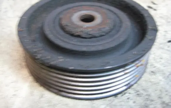 Renault Laguna I Belt tensioner pulley 22D