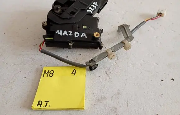 Mazda 323 F Rear door lock 655899