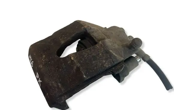 Volkswagen Golf VI Front brake caliper 