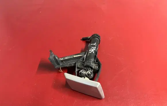 Cadillac SRX Headlight washer spray nozzle