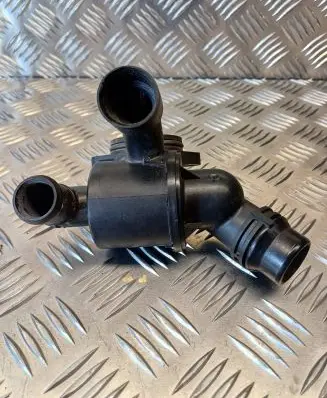 Thermostat/thermostat housing